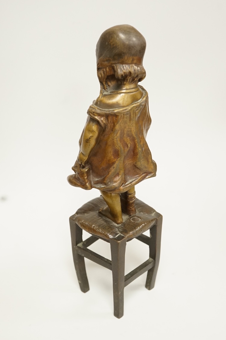 Juan Clara, a figure of a girl on a stool, 21.5cm high